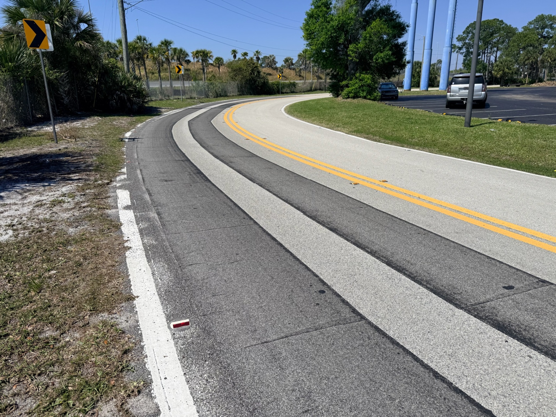Roadway Safety Strip high-friction surface treatment applied on a reverse banked bend